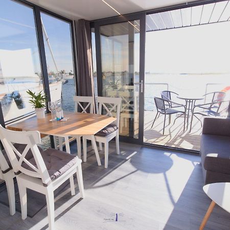 Hausboot Fjord Lacerta Mit Dachterrasse In Wendtorf Eksteriør billede